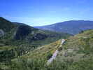 Auteur : Siberian Wolf 10, Commentaire : Photo t&eacute;l&eacute;charg&eacute;e sur Wikim&eacute;dia Commons &lpar;auteur&colon; Anthospace&rpar;&colon; plus bas la route du col de Macu&egrave;gne vers le lieu-dit &laquo; Le Moulin de Barret &raquo;&period;